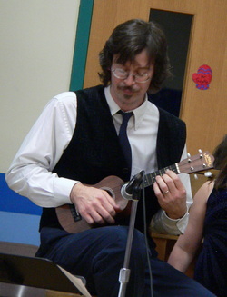 Playing ukulele along with the NEK Music Festival Chorus 2011